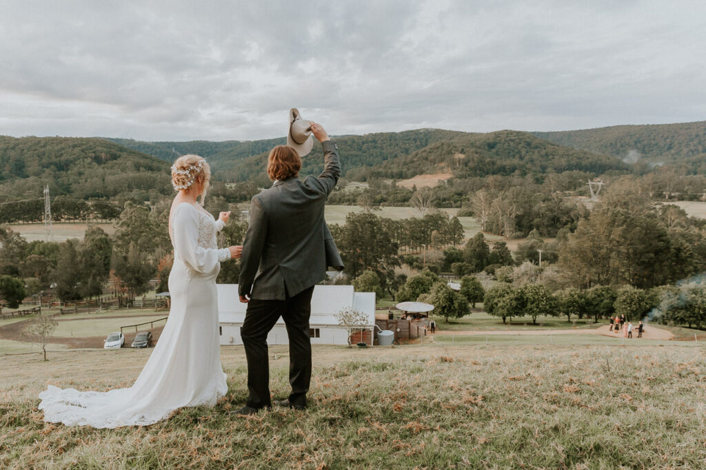 Elopement vs Micro-Wedding. What's the difference?

A couple at their country estate micro-wedding overlooking hills
